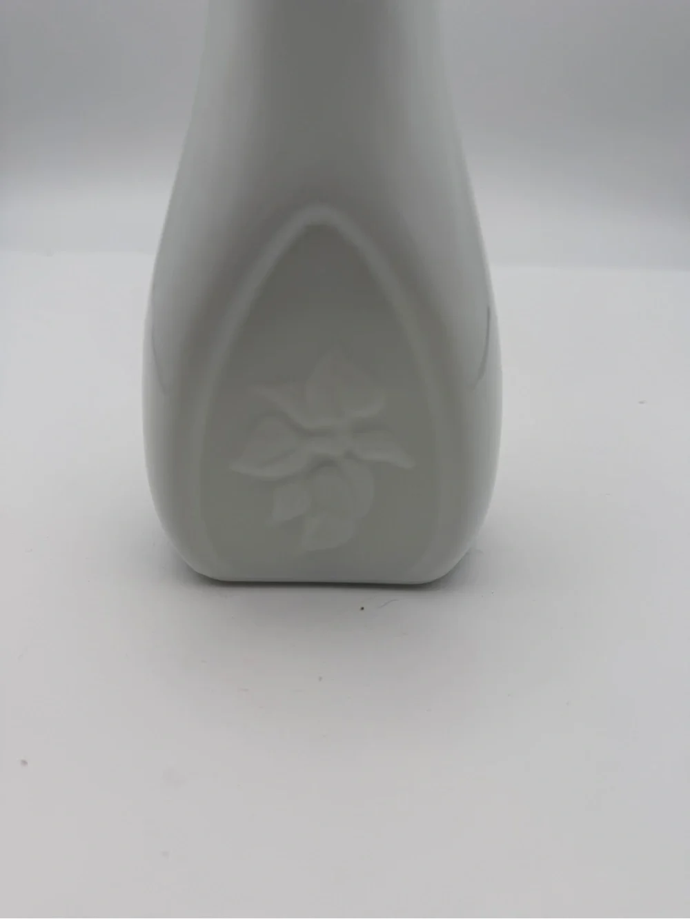 Vintage vase milk glass with embossed vines and scalloped rim